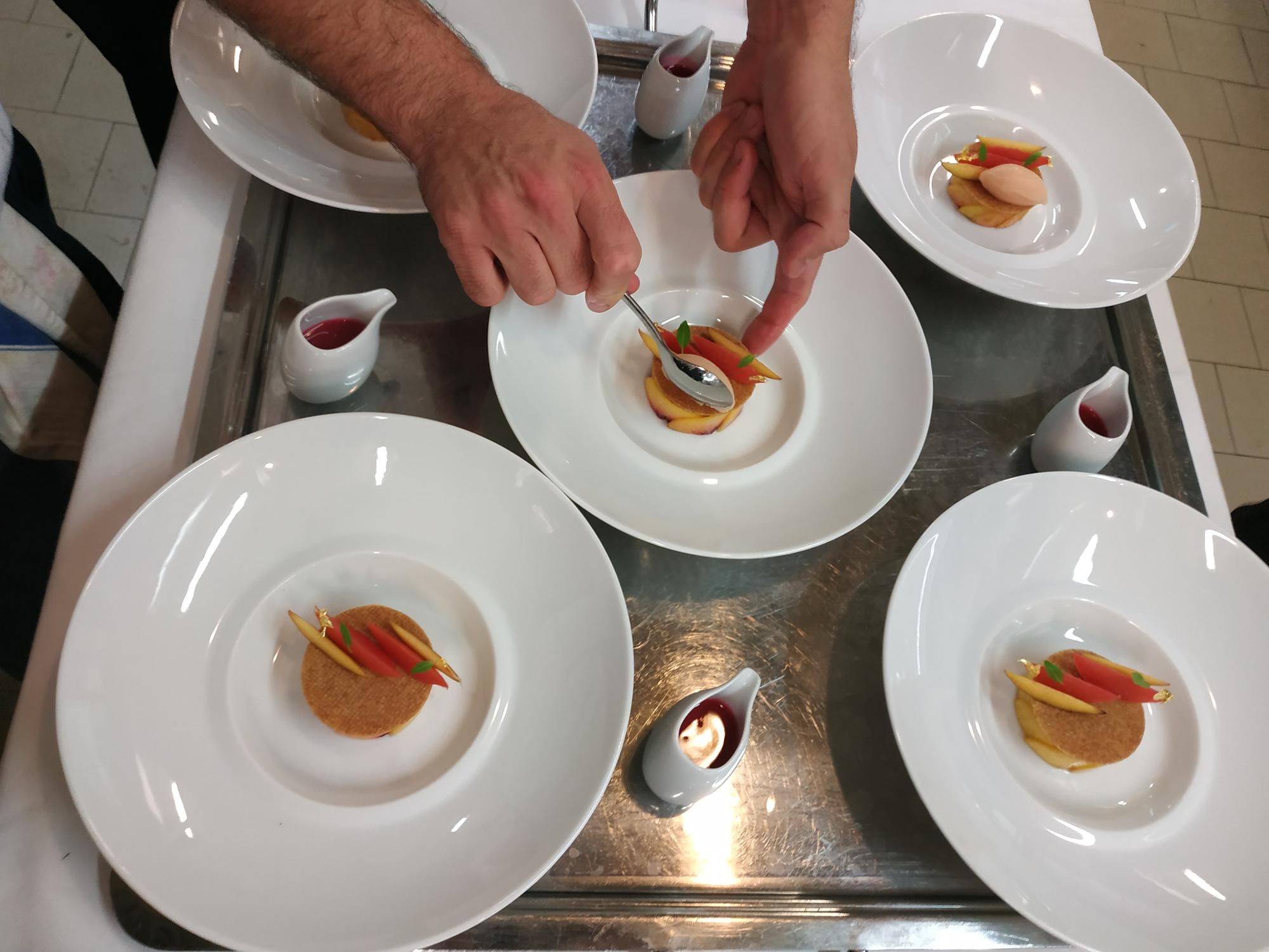 small service team arranging plates on a table